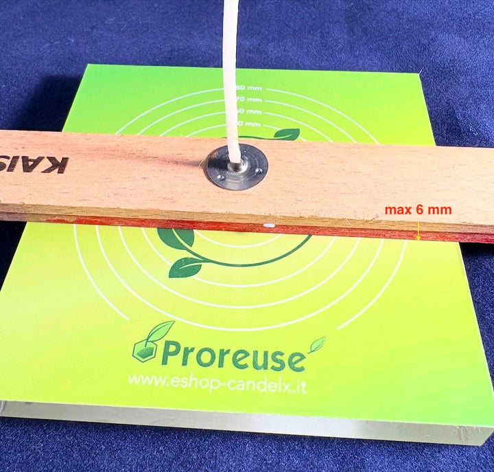 Adesivo magnetico per stoppini candela