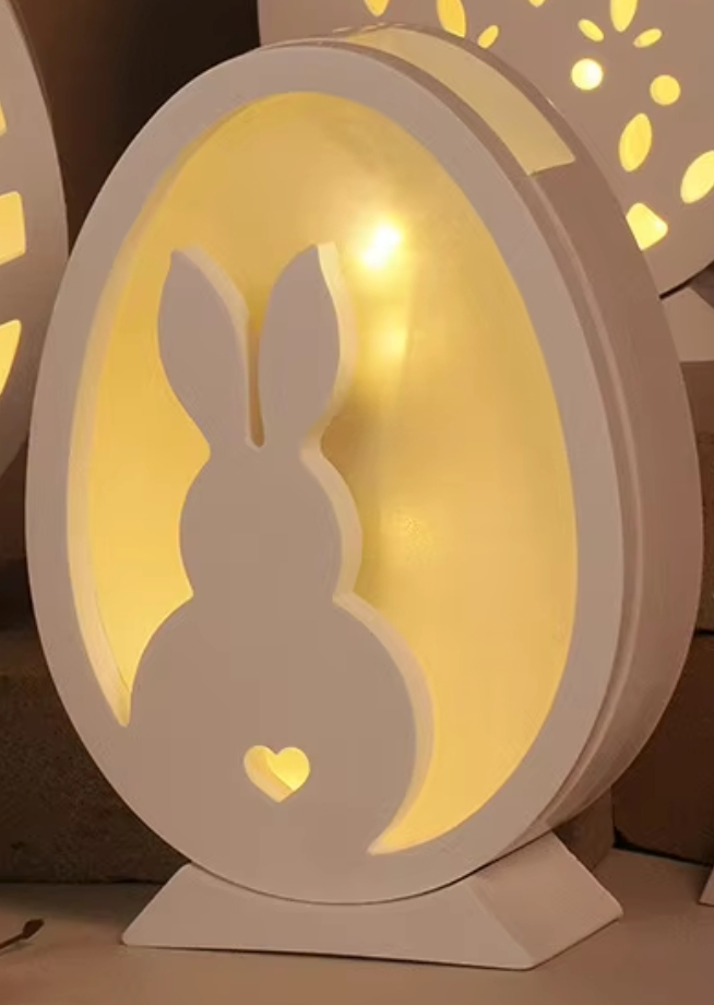 Stampo a forma di uovo con coniglio